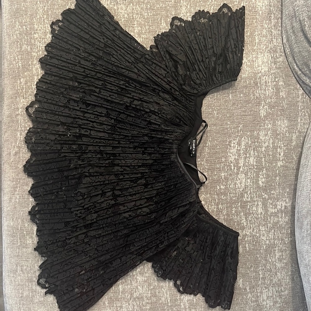 Bebe off shoulder strapless lace covered crop top, black.